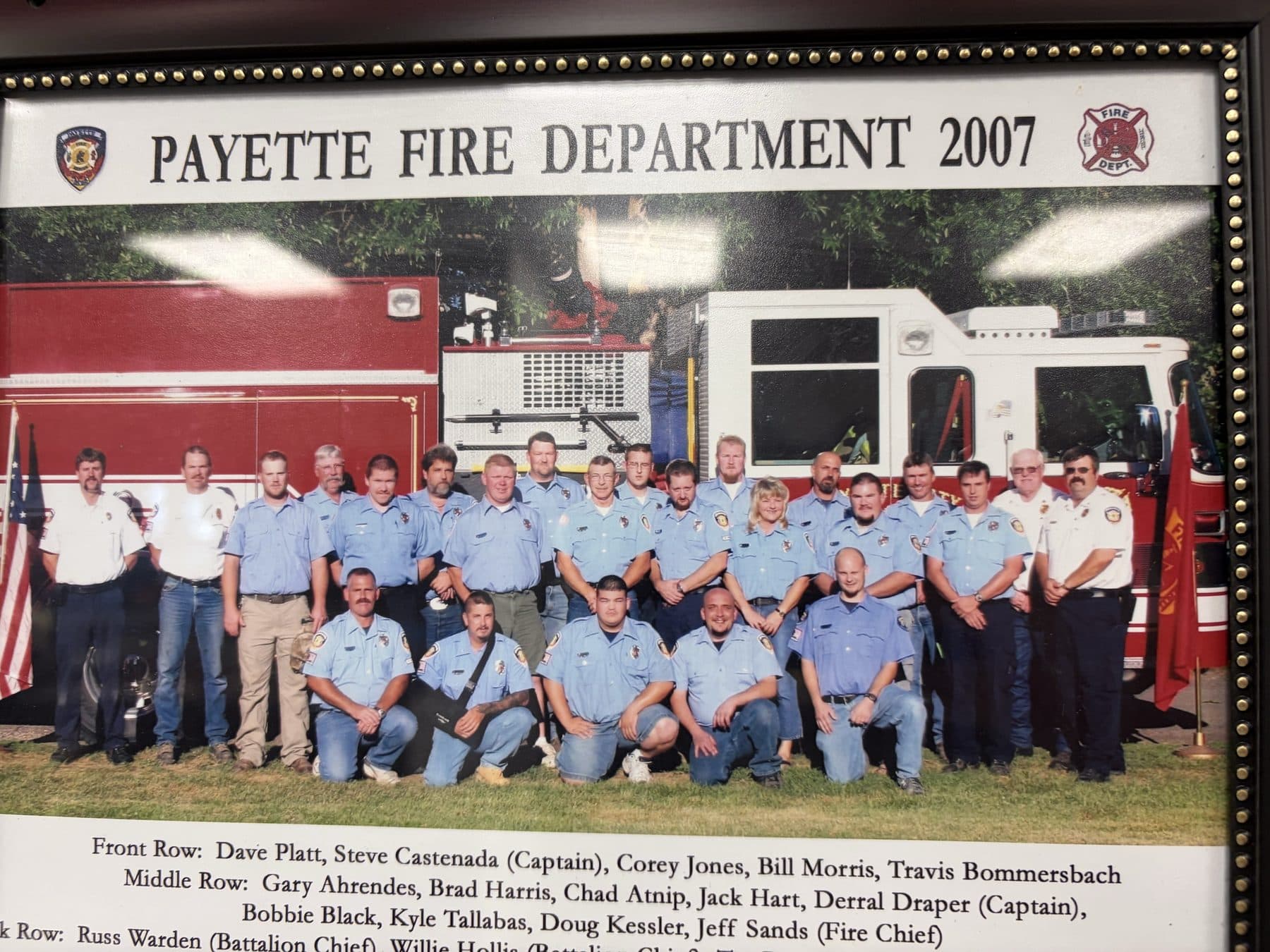 Payette Fire Department 2007 crew photo outdoors in front of two fire engines