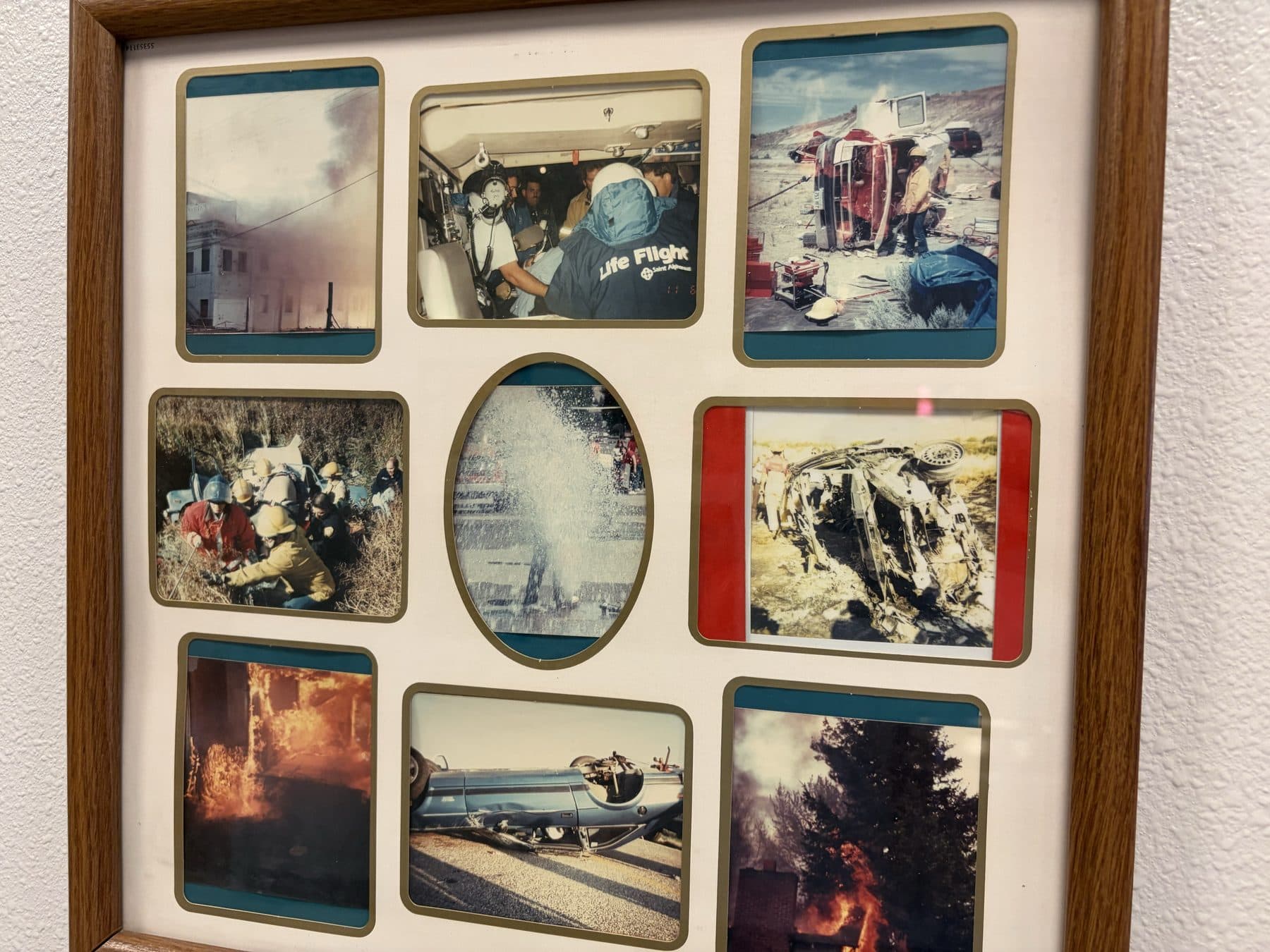 Framed collage of nine small Payette Fire Department incident photographs including structure fires, extrication, and a Life Flight helicopter