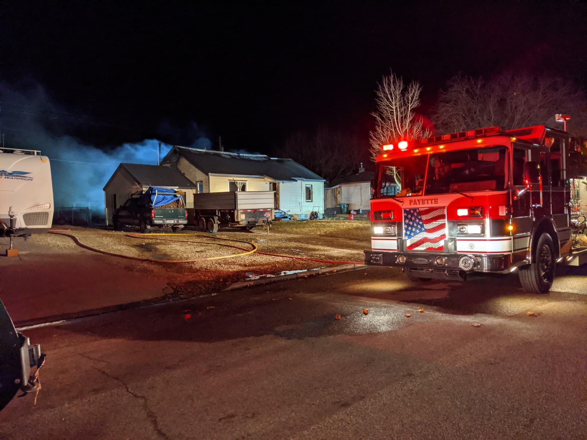 A Payette fire engine lit up on a call at night