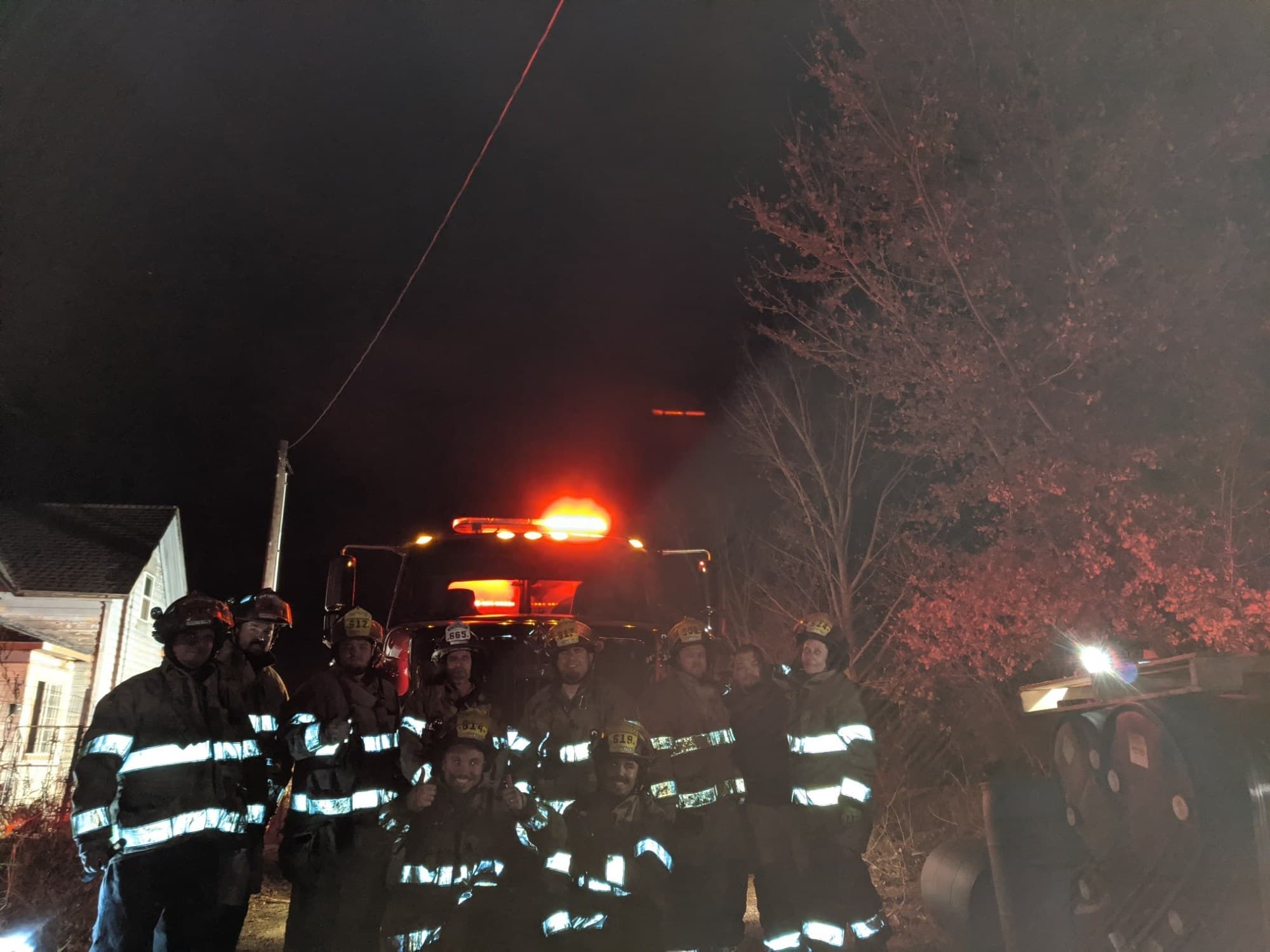 Payette firefighters working together on scene at night